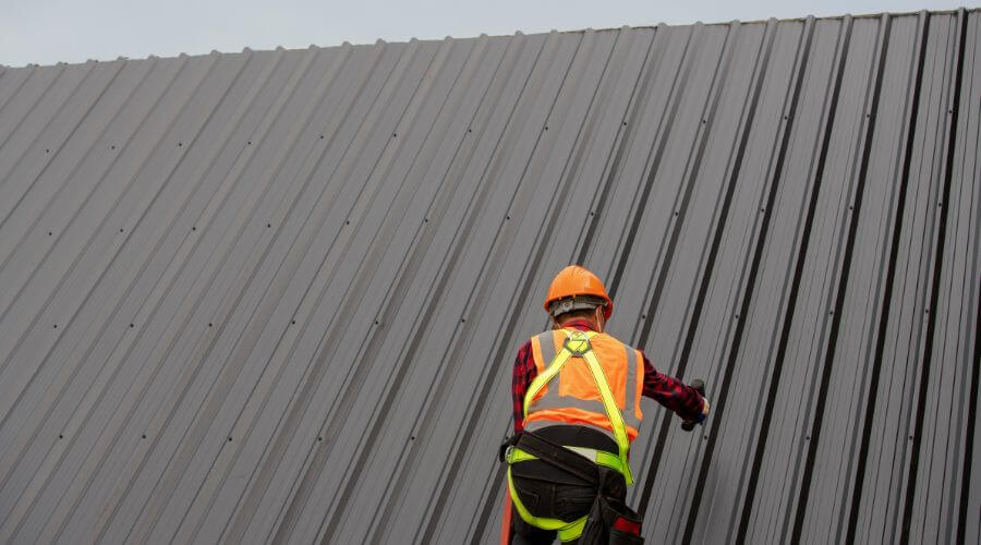 Professional metal roof installation services in Higgins Lake, MI